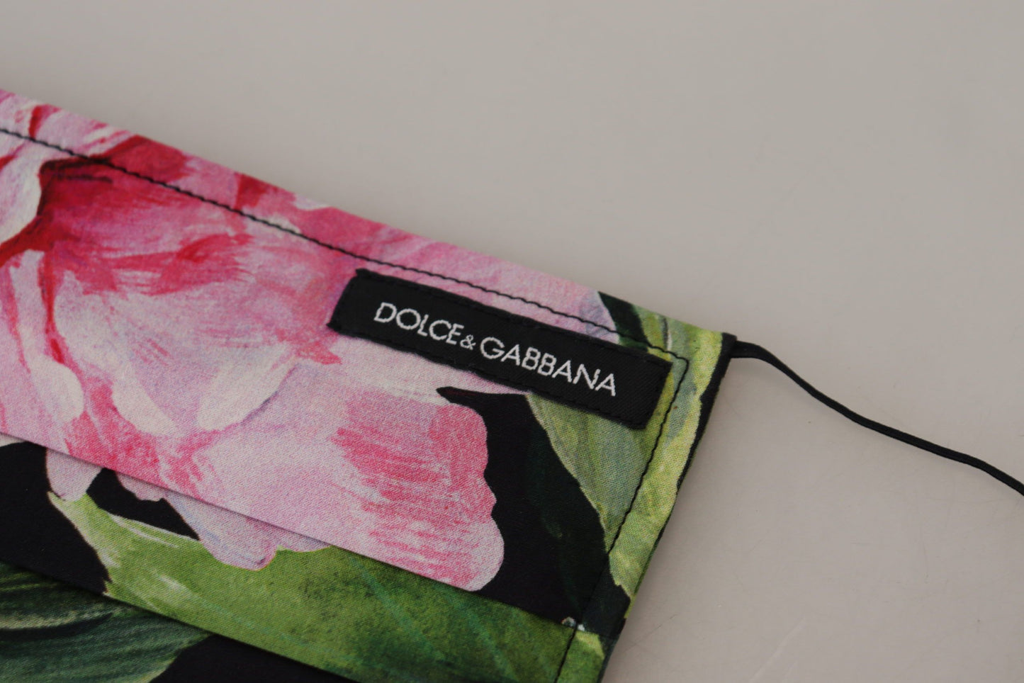 Masque facial plissé à motif floral noir Dolce & Gabbana avec élastiques et attaches pour les oreilles