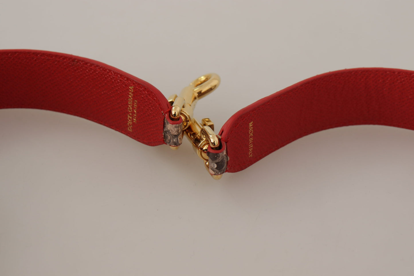 حقيبة يد Dolce & Gabbana من الجلد المصنوع من جلد الأفعى البني مع أحجار كريستال وحزام كتف.