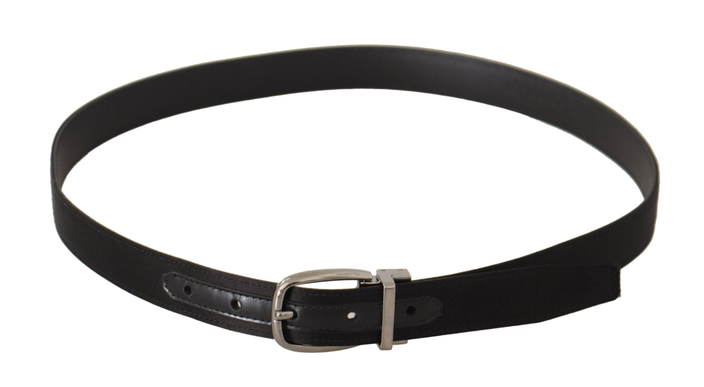 Ceinture en cuir de veau noir avec boucle en métal argenté et logo de la marque Dolce & Gabbana.