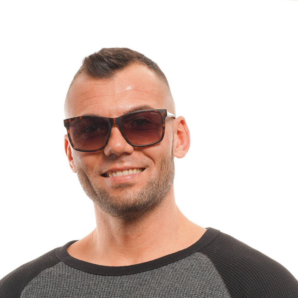 Lunettes de soleil Guess marron pour homme