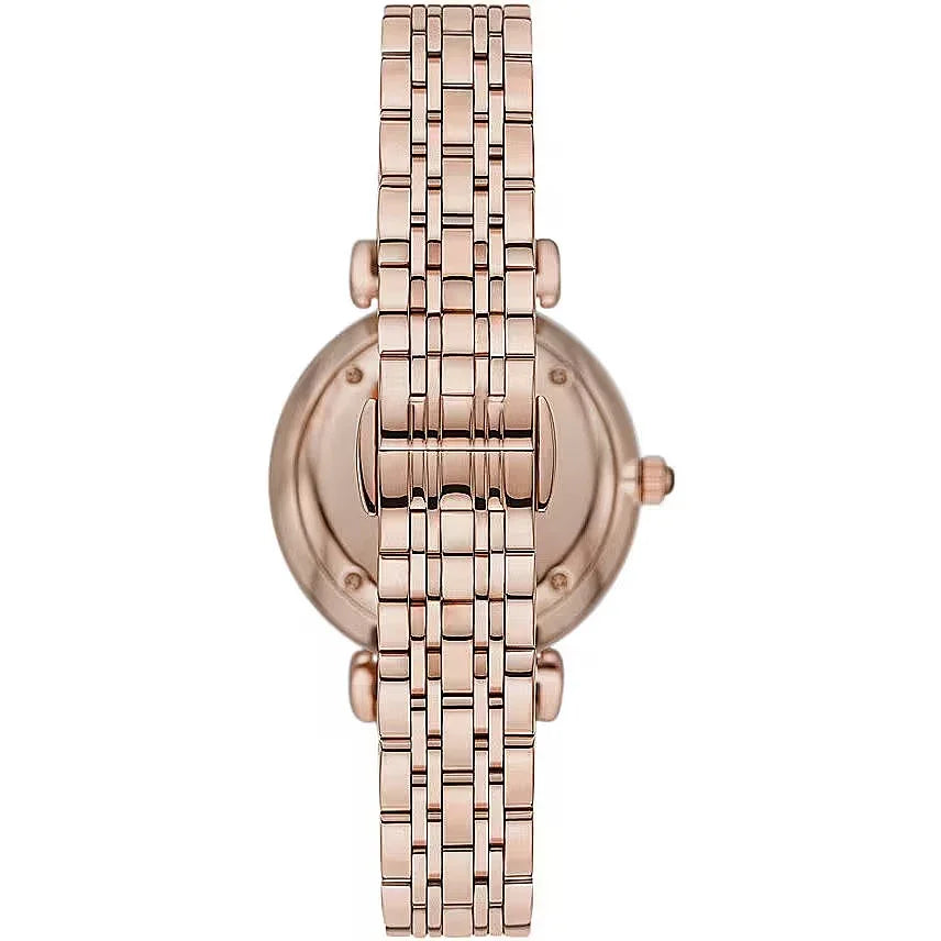 Montre élégante pour femme, ton or rose.