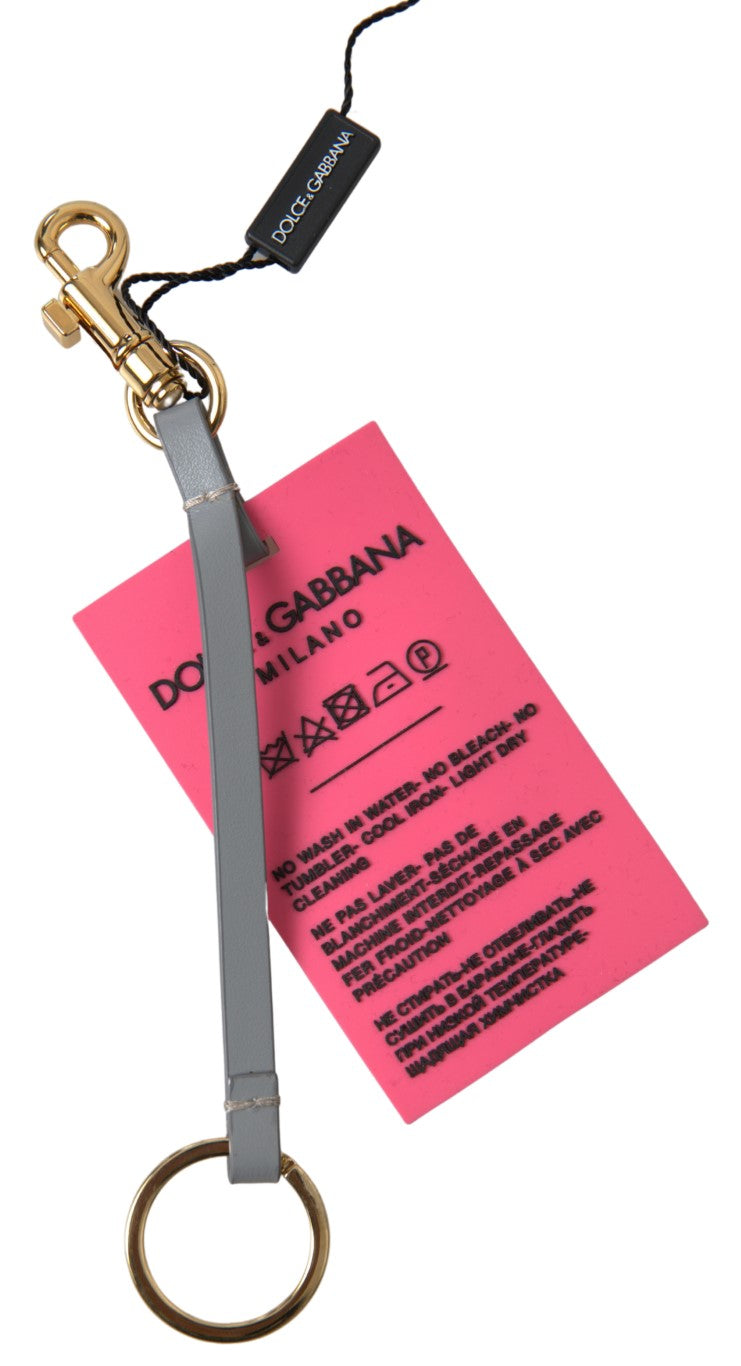 Porte-clés Dolce &amp; Gabbana en silicone rose avec logo DG et laiton doré pour femme