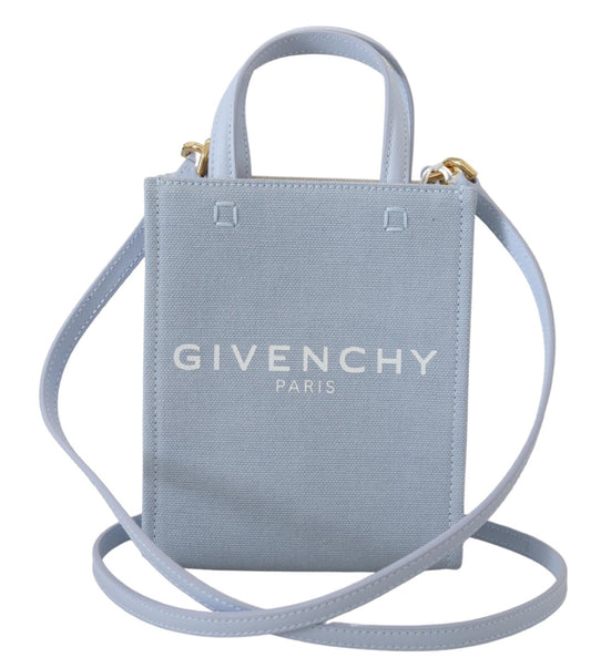 Givenchy – Vertikale, kleine Schultertasche aus beschichtetem Canvas in Blau mit Wolken-Motiv