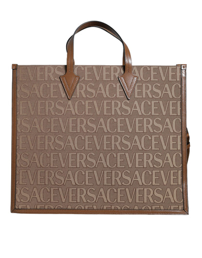 Versace – Umhängetasche aus Jacquardleder mit Logo in Braun mit Henkel