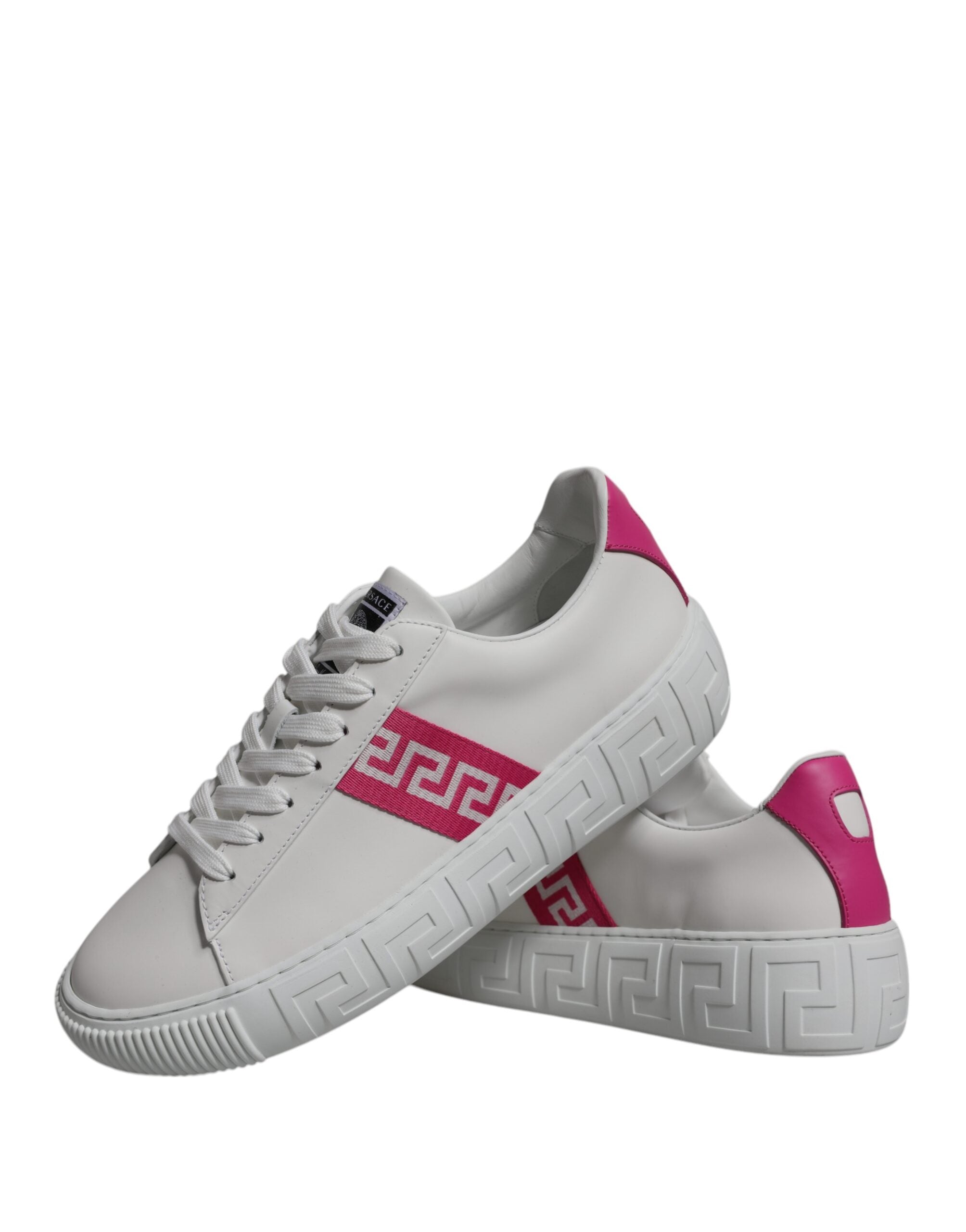 Sneakers basses à plateforme blanches et roses à imprimé grec.