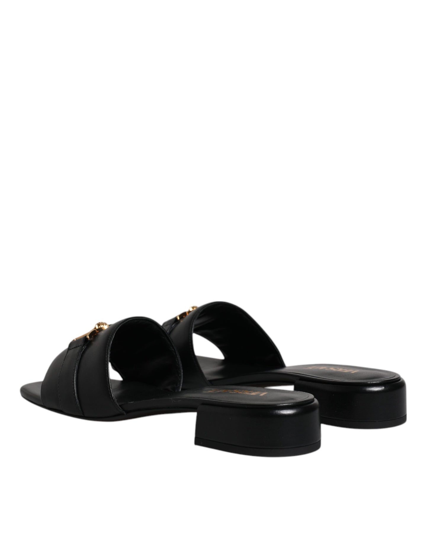Claquettes plates à enfiler en cuir noir avec plaque logo Versace
