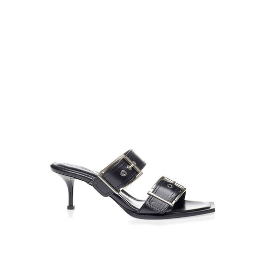 Alexander McQueen: Erhöhen Sie Ihre Schritte in zeitlosen schwarzen Ledersandalen