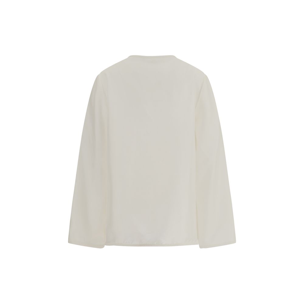 Polo Courrèges avec détail torsadé