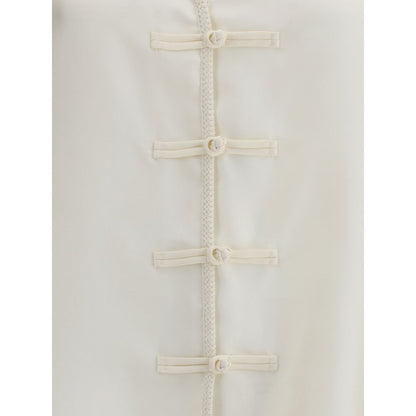Polo Courrèges avec détail torsadé