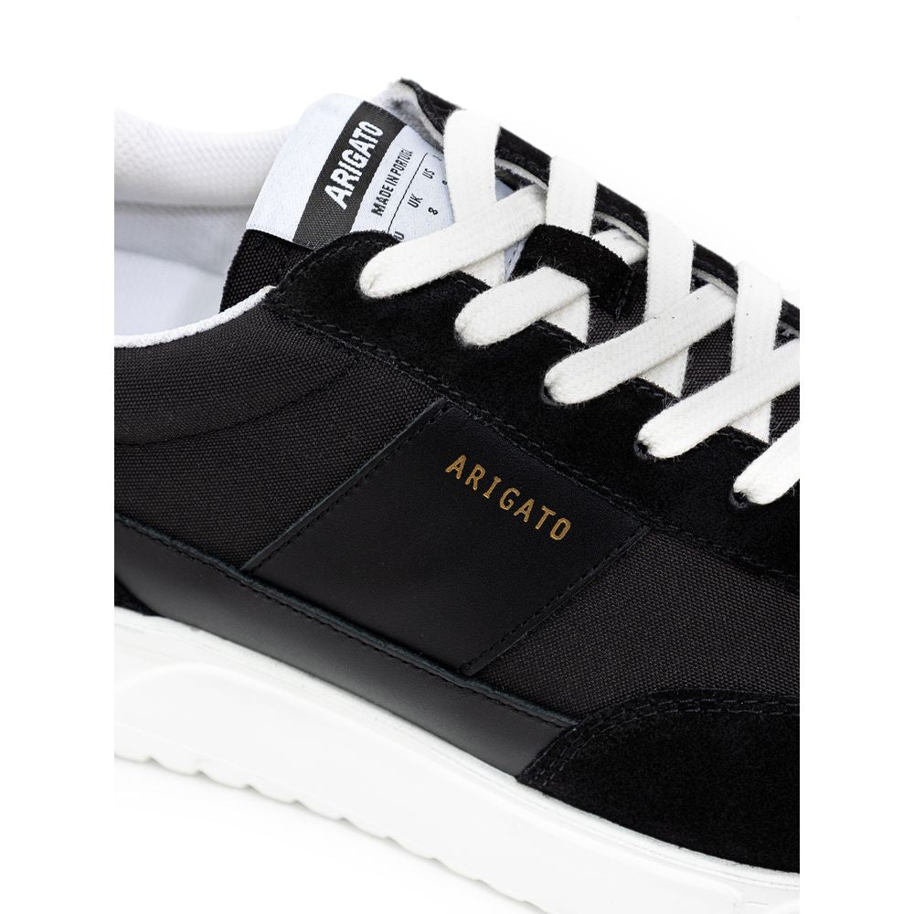 Axel Arigato Sneaker aus Stoff und Leder in Schwarz und Weiß