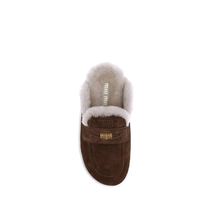 Miu Miu Pantoletten aus Lammfell
