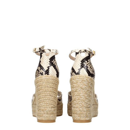 Stuart Weitzman – Beige Keilsandalen aus Leder