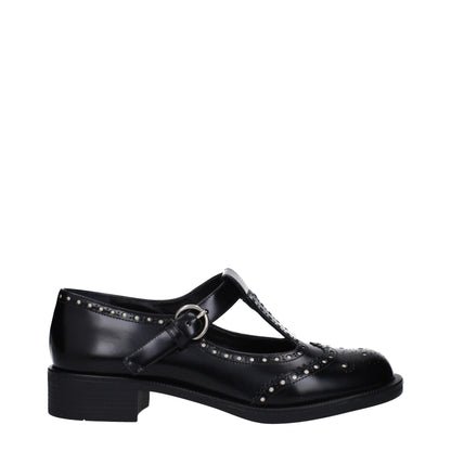 Miu Miu – Slipper aus schwarzem Leder