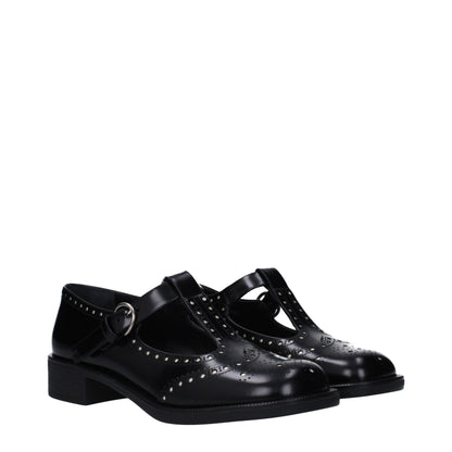 Miu Miu – Slipper aus schwarzem Leder