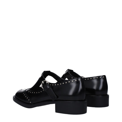 Miu Miu – Slipper aus schwarzem Leder