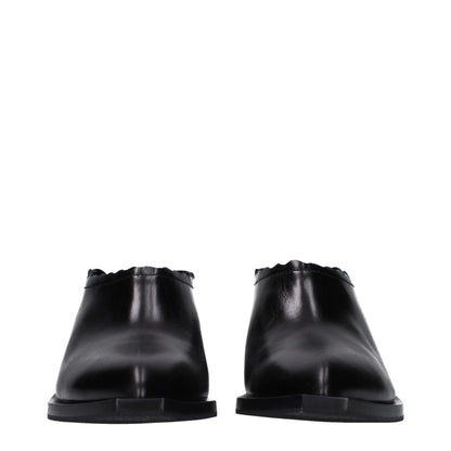 Love Moschino – Schwarze Lederclogs
