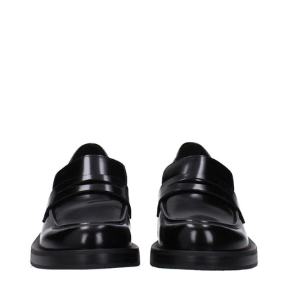 Stuart Weitzman – Slipper aus schwarzem Leder