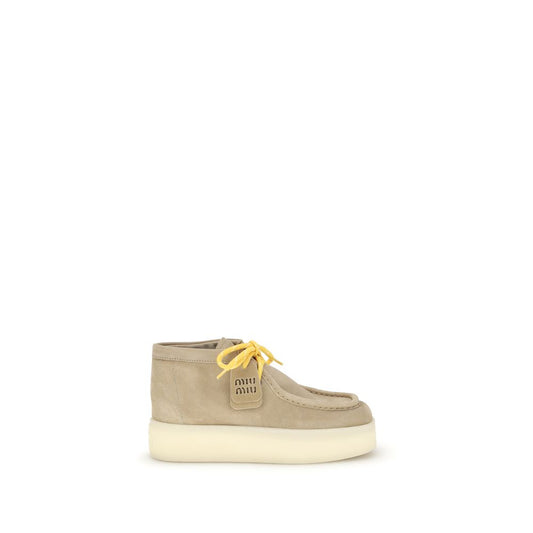 Miu Miu Plateau-Stiefeletten aus Leder