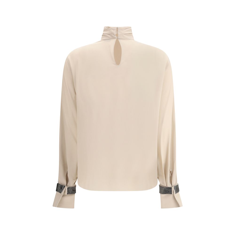 Brunello Cucinelli Seiden-Rollkragenbluse mit edlen Armbändern