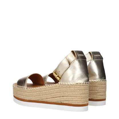 See By Chloé Keilsandaletten aus goldfarbenem Leder