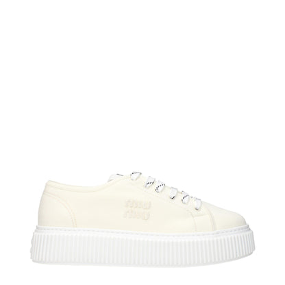 Sneakers à plateforme en tissu beige de Miu Miu