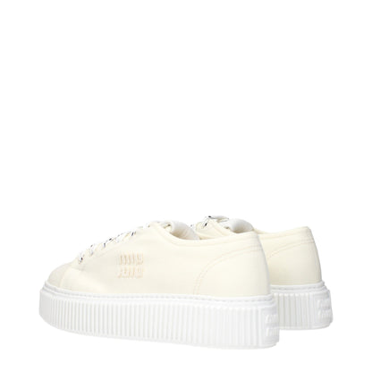 Sneakers à plateforme en tissu beige de Miu Miu