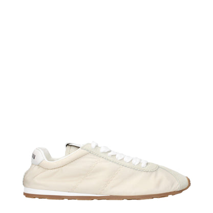 Baskets basses en tissu beige de Miu Miu