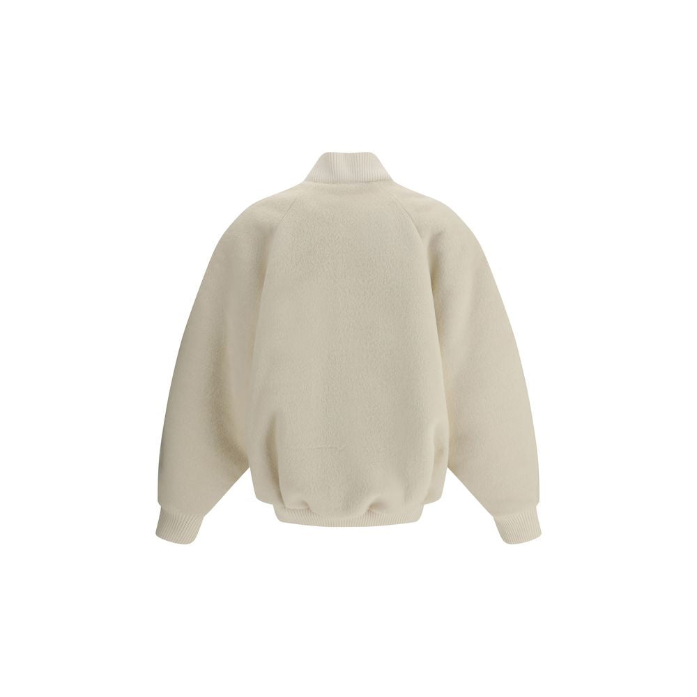 La veste Le Blouson Pilu en laine d'alpaga blanche.
