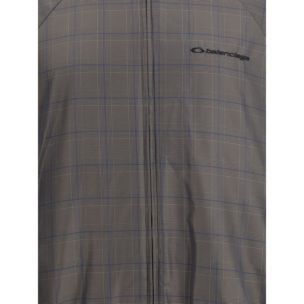 Veste zippée à motif à carreaux marron et bleu
